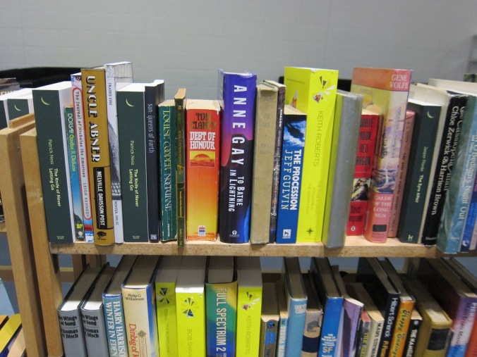 LonCon3 Library shelf - spot SUN!